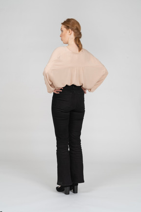 Woman in beautiful blouse standing
