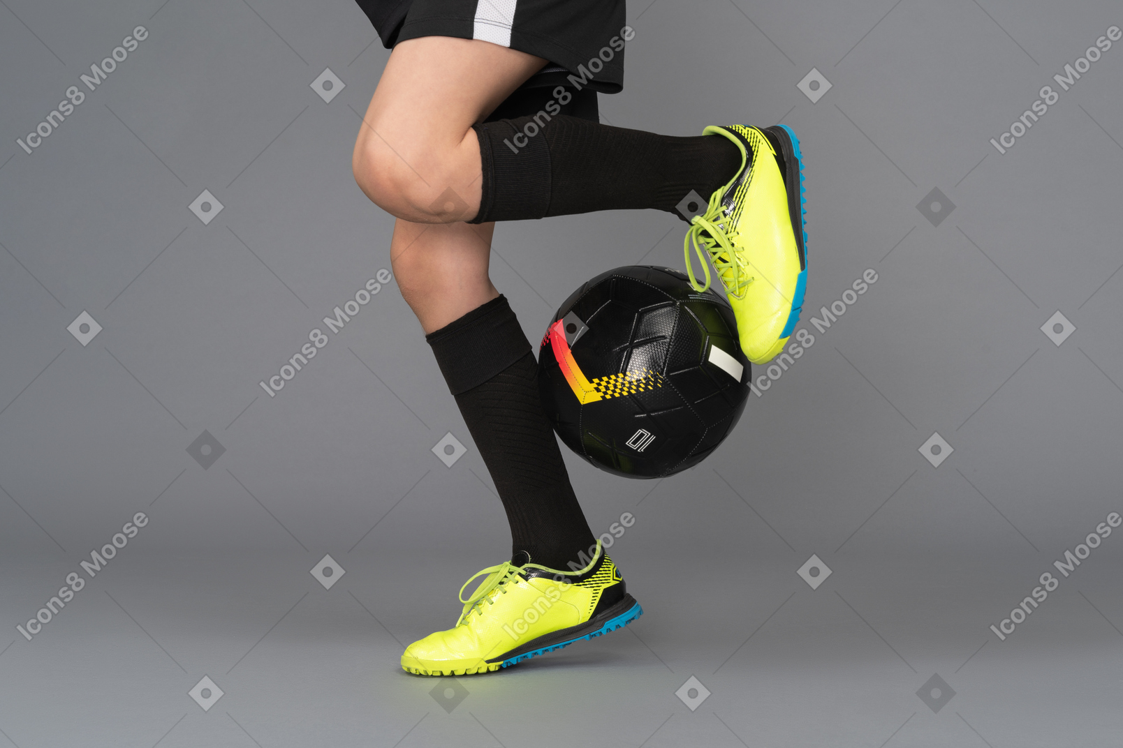 Close-up das pernas de um jogador de futebol