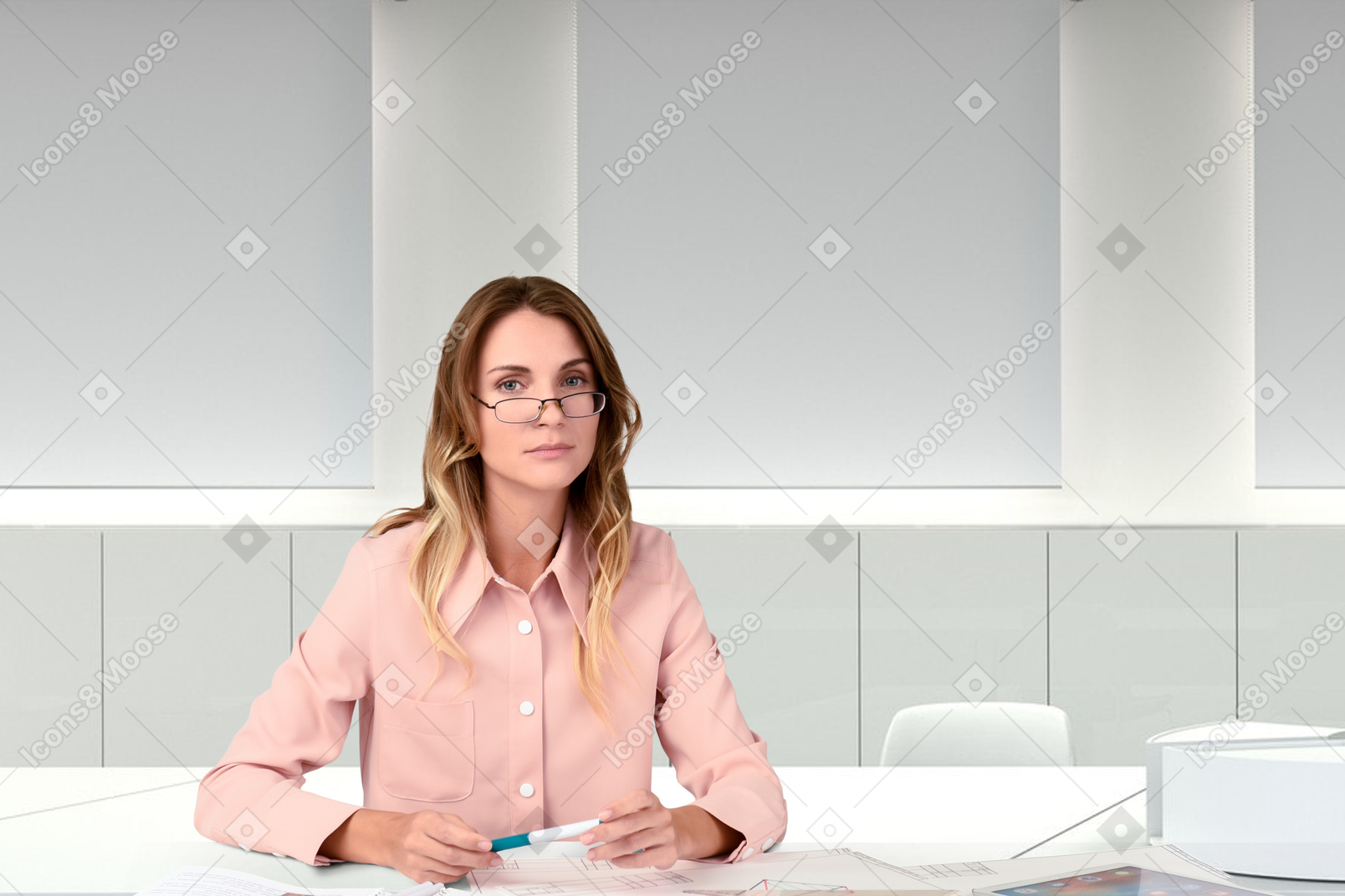 Woman sitting at a desk with a laptop