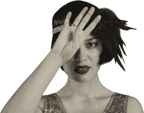Close-up of a flapper covering face with one palm