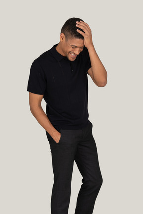 Smiling young man in black
