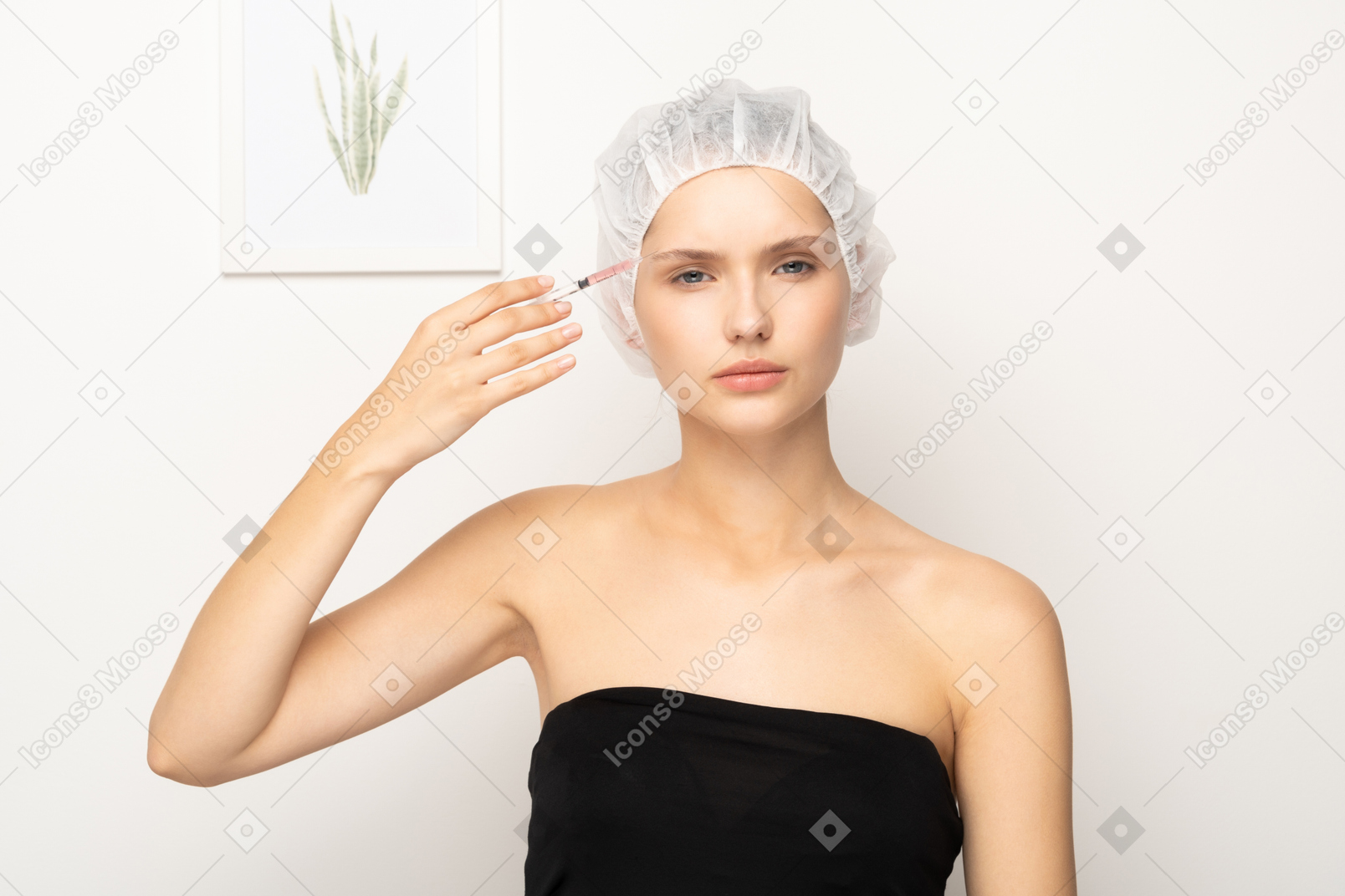 Woman making injection to her face