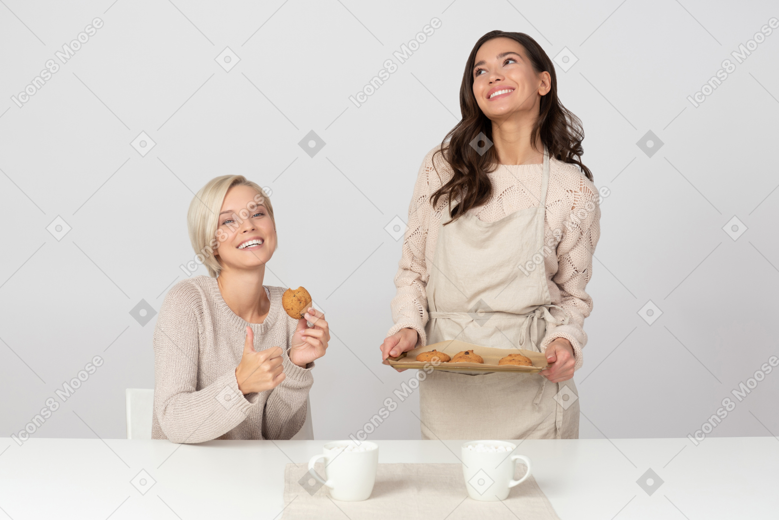 Young woman trying her friend's homemade cookies