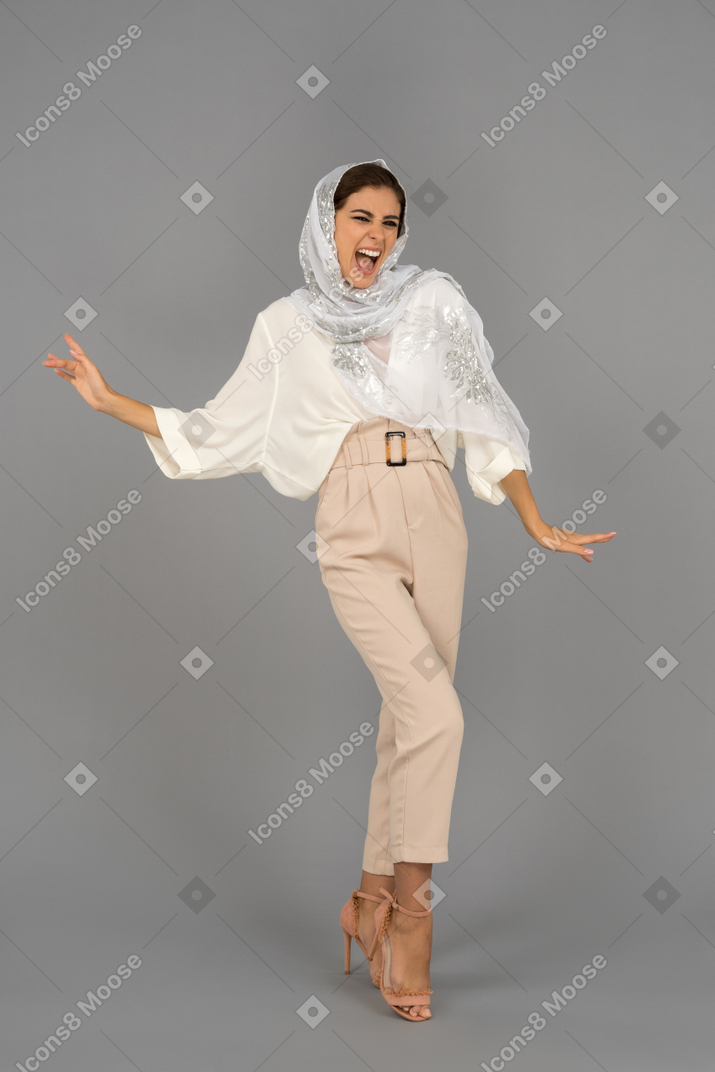 Excited arab woman feeling the winner