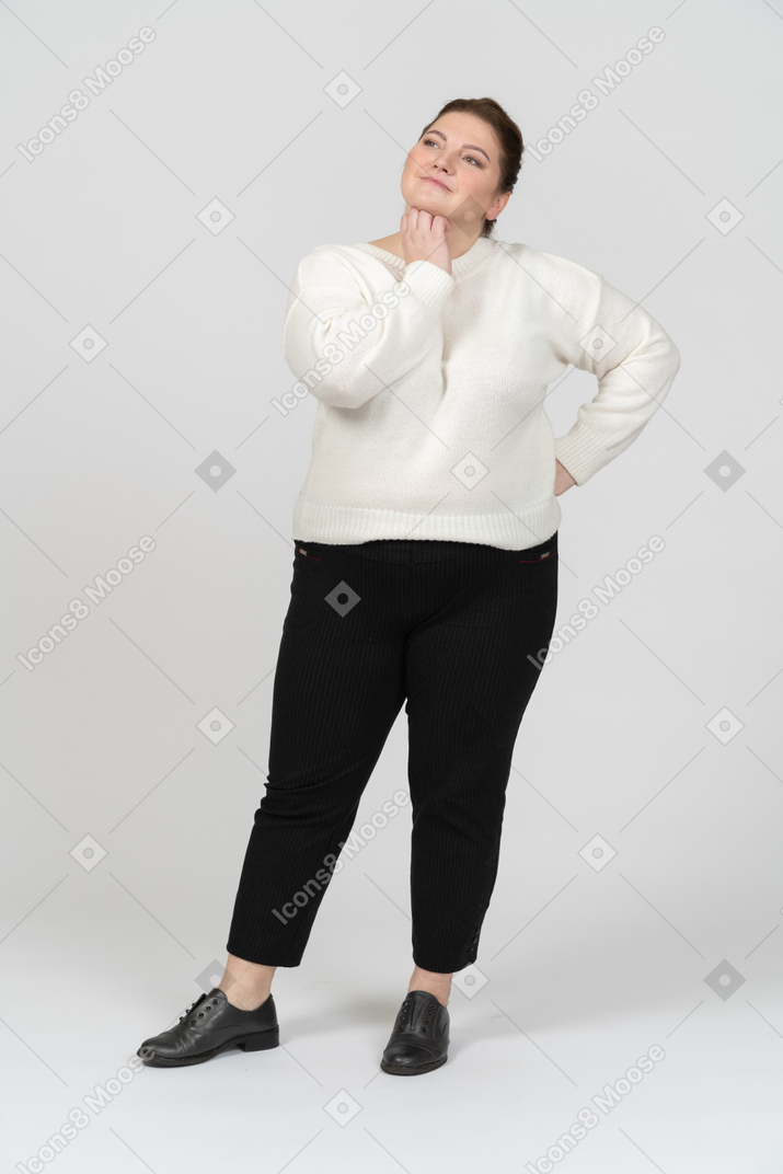 Plus size woman in casual clothes dreaming