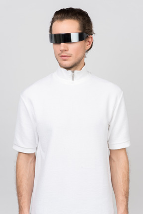 Portrait of young man wearing futuristic eyewear