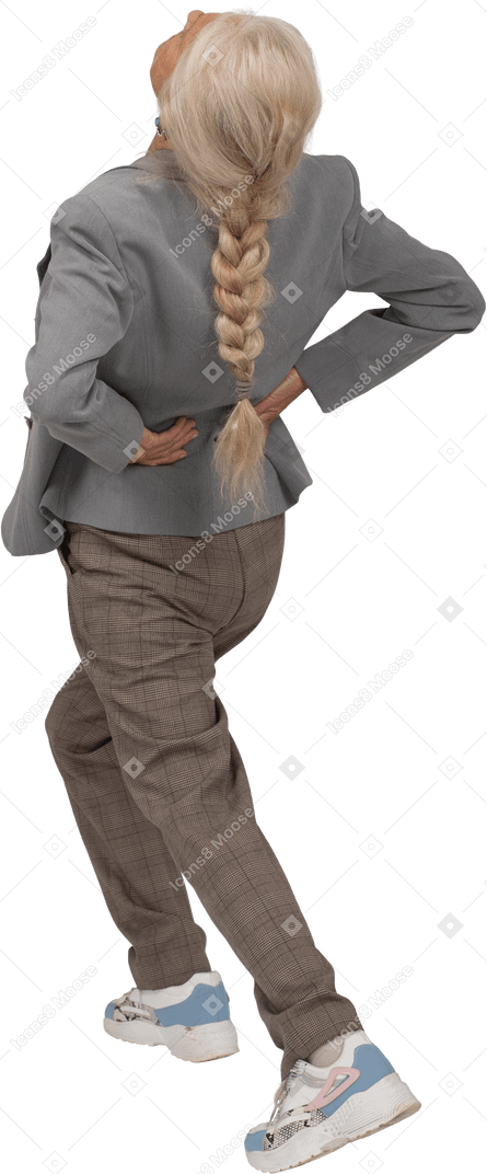 Rear view of an old lady in suit doing yoga