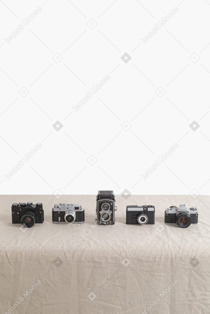 Vintage cameras on table