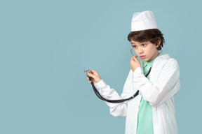 Attractive teenage in a doctor's outfit