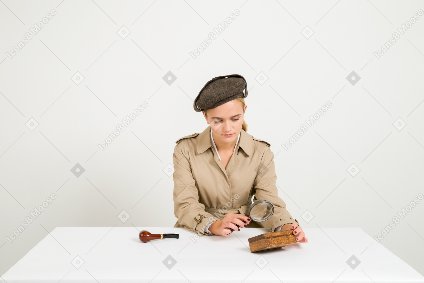 Female detective looking through magnifying glass