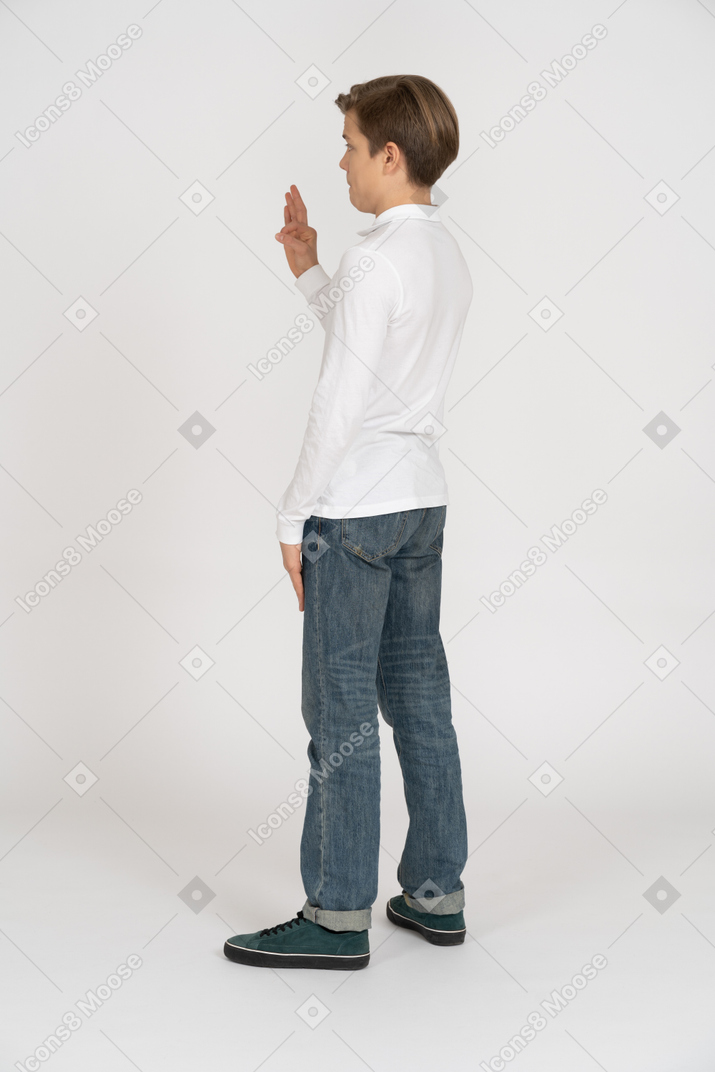 Young man in casual clothes standing