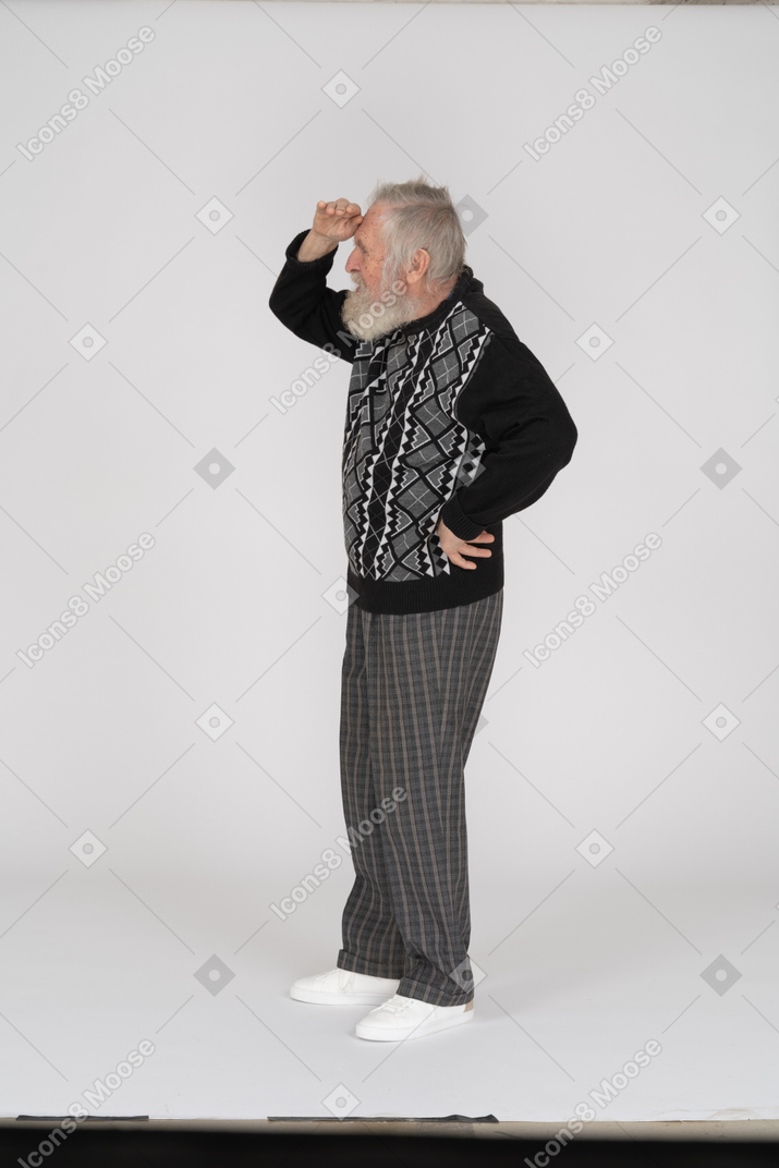 Side view of old man looking into distance