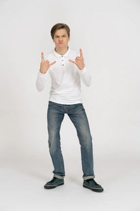 Young man in casual clothes standing