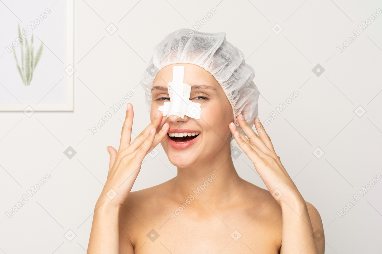 Portrait of smiling woman with bandage on her nose after plastic surgery