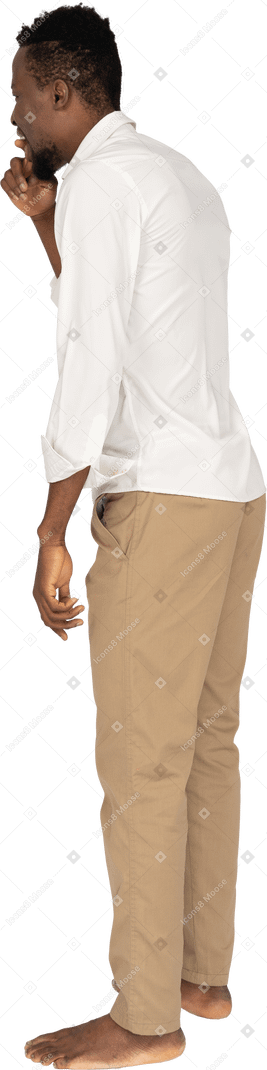 Man in white shirt standing