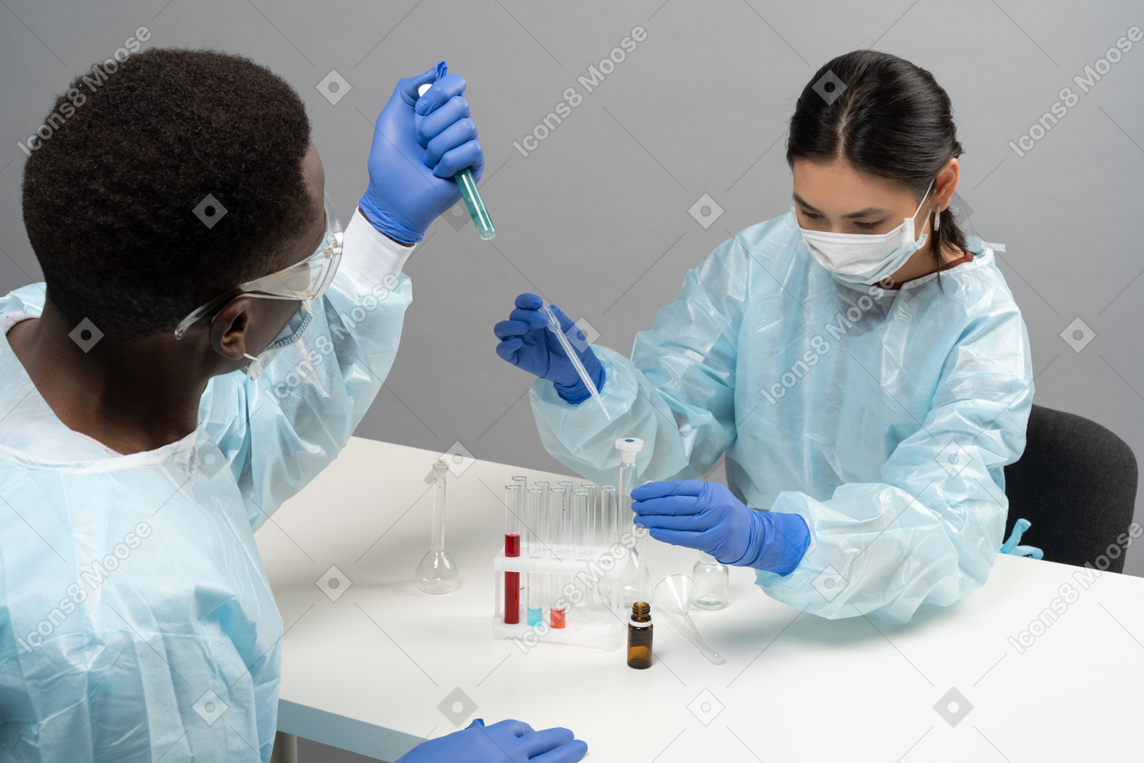 Two colleagues in medical laboratory