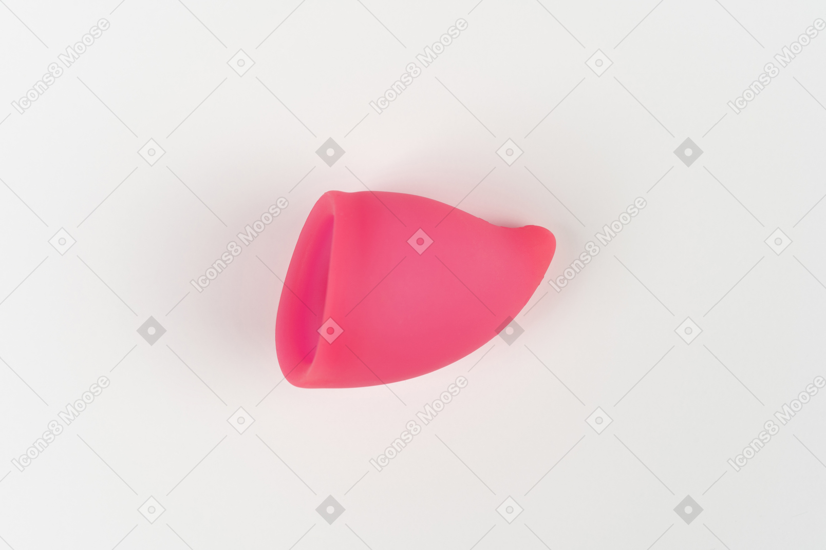 Close up of a pink menstrual cup