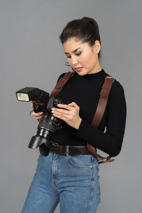 Young woman viewing snapshots