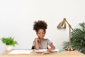 Cute girl doing homework