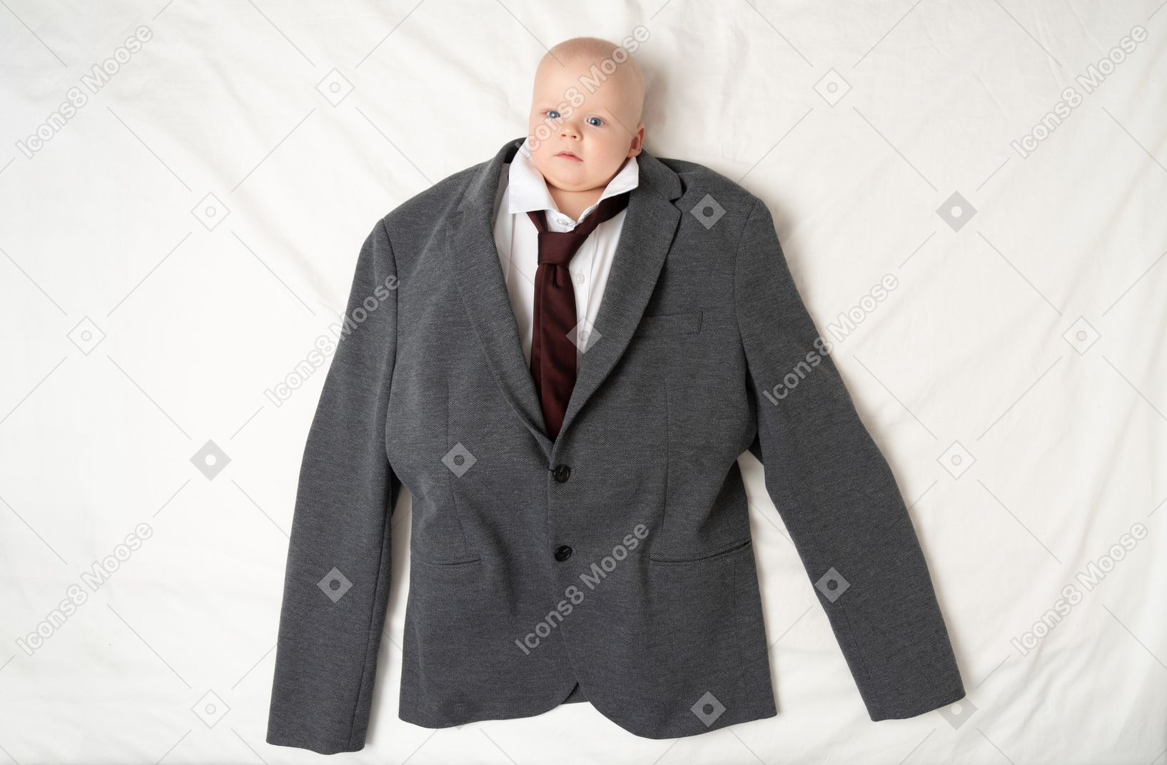 Trying on some father's clothes