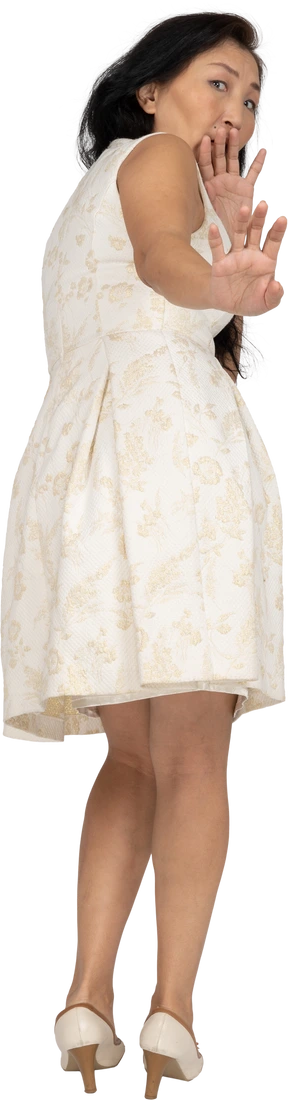 Woman in beautiful dress standing