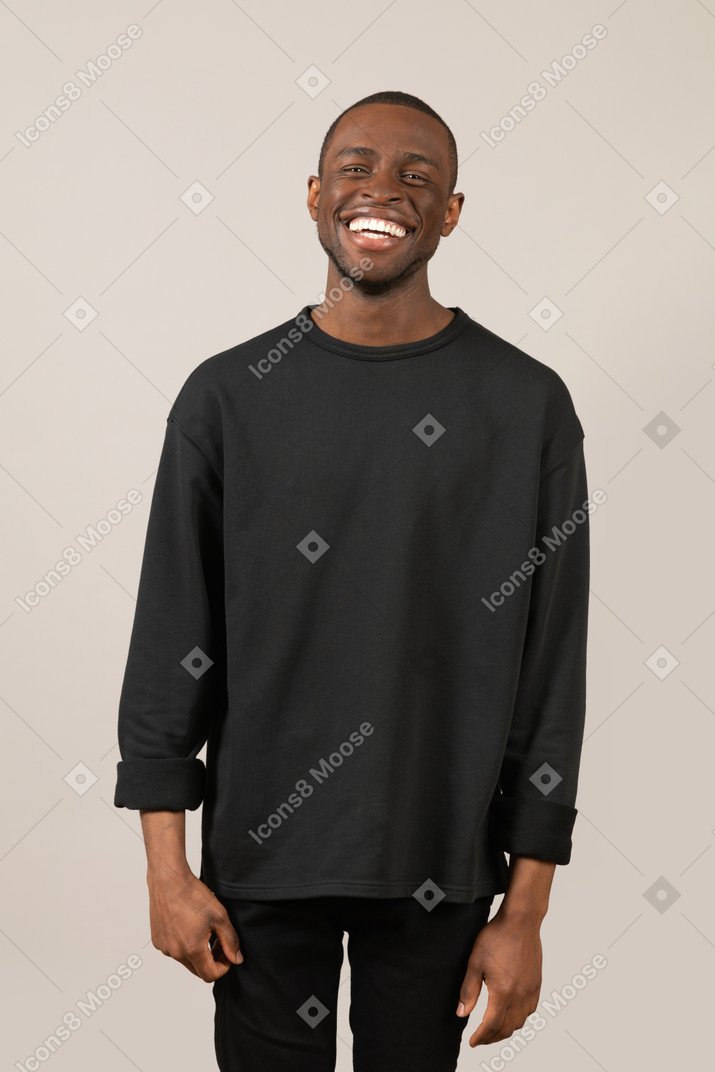 Happy young man smiling