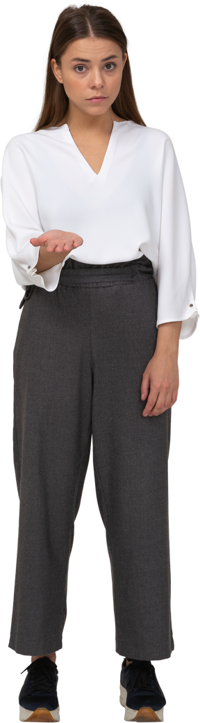 Front view of a young lady in office clothing asking for something