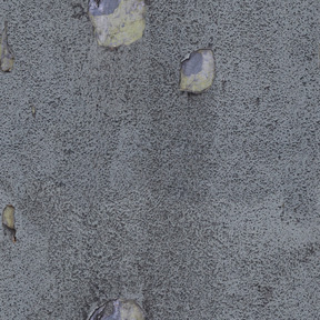 Surface en pierre recouverte d'une couche de plâtre gris