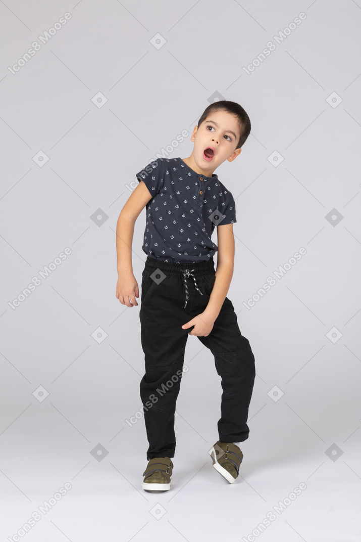 Front view of a cute boy posing with open mouth