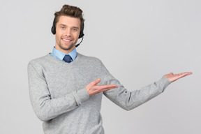 Call center agent showing a way to go with hands