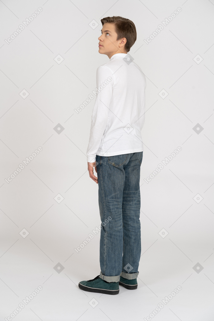 Young man in casual clothes standing