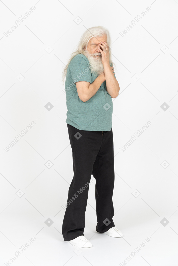 Three-quarter view of old man feeling ashamed