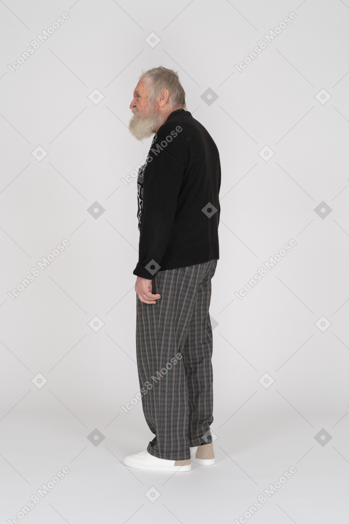 Side view of an old man looking angry