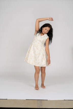 Woman in beautiful dress standing
