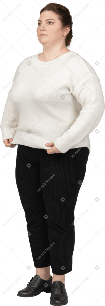 Side view of a serious plump woman in casual clothes