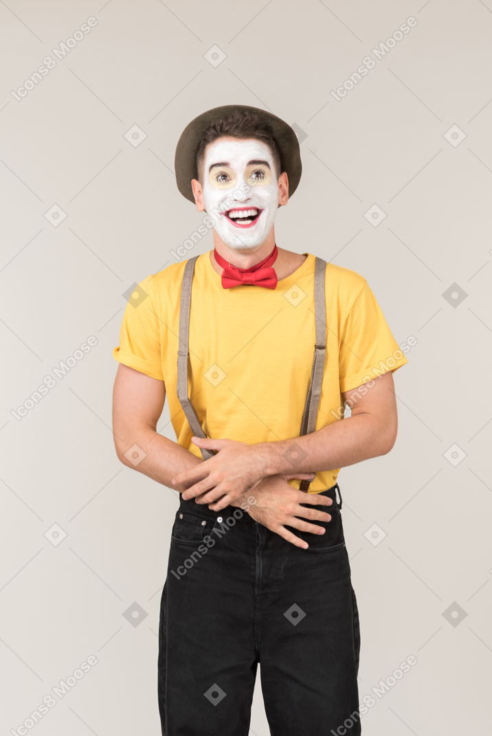Male clown laughing out loud