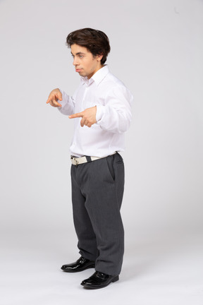 Young man standing and gesturing