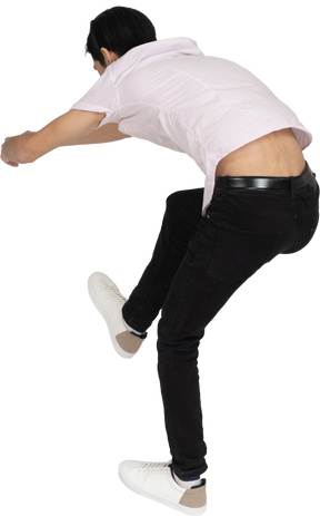 Man in casual clothes falling