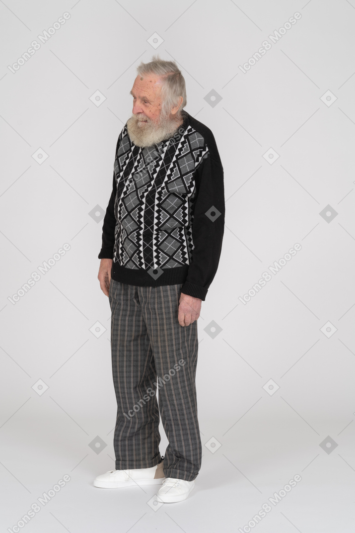 Smiling elderly man standing