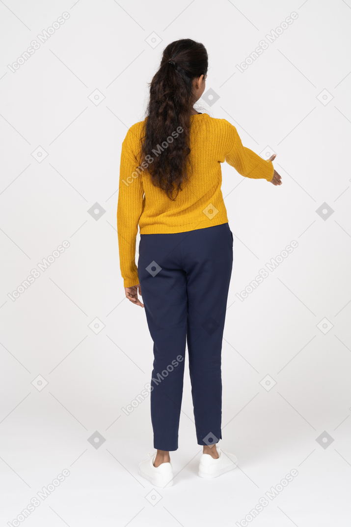 Rear view of a girl in casual clothes giving a hand for shake