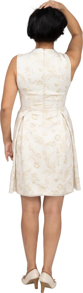 Woman in beautiful dress standing