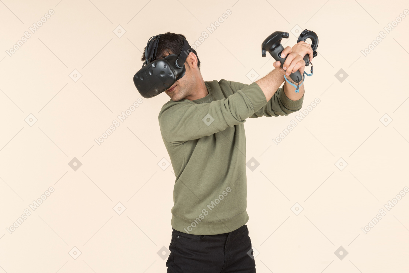 Young caucasian guy playing a virtual reality game