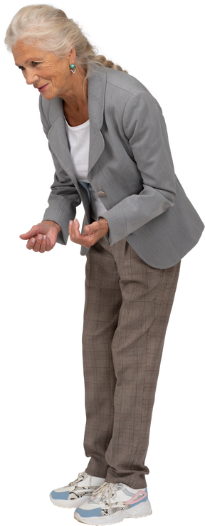 Side view of a happy old lady in suit bending down