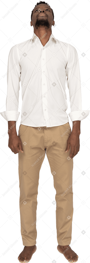 Man in white shirt standing