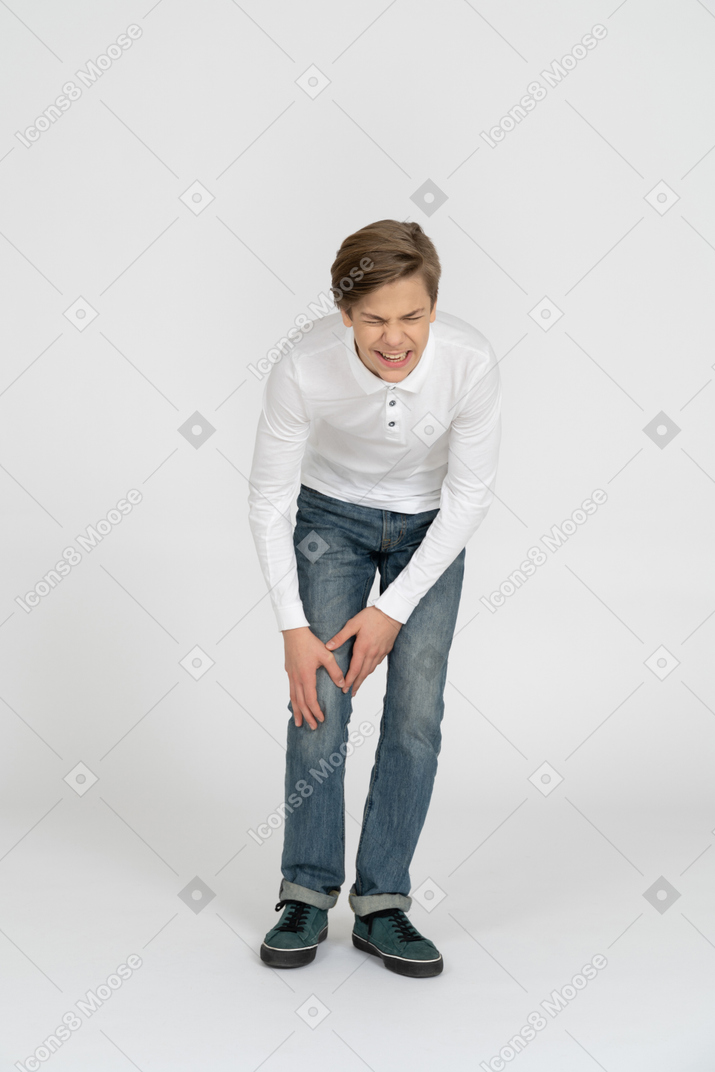 Young man in casual clothes standing