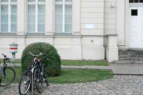 The view of the bike parking near buildingg