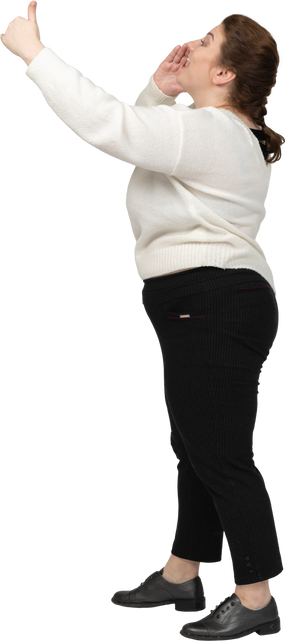 Side view of a plus size woman in casual clothes calling someone