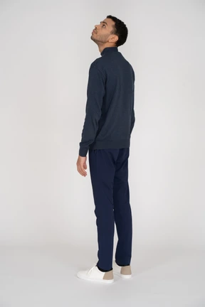 Back view of a man looking up
