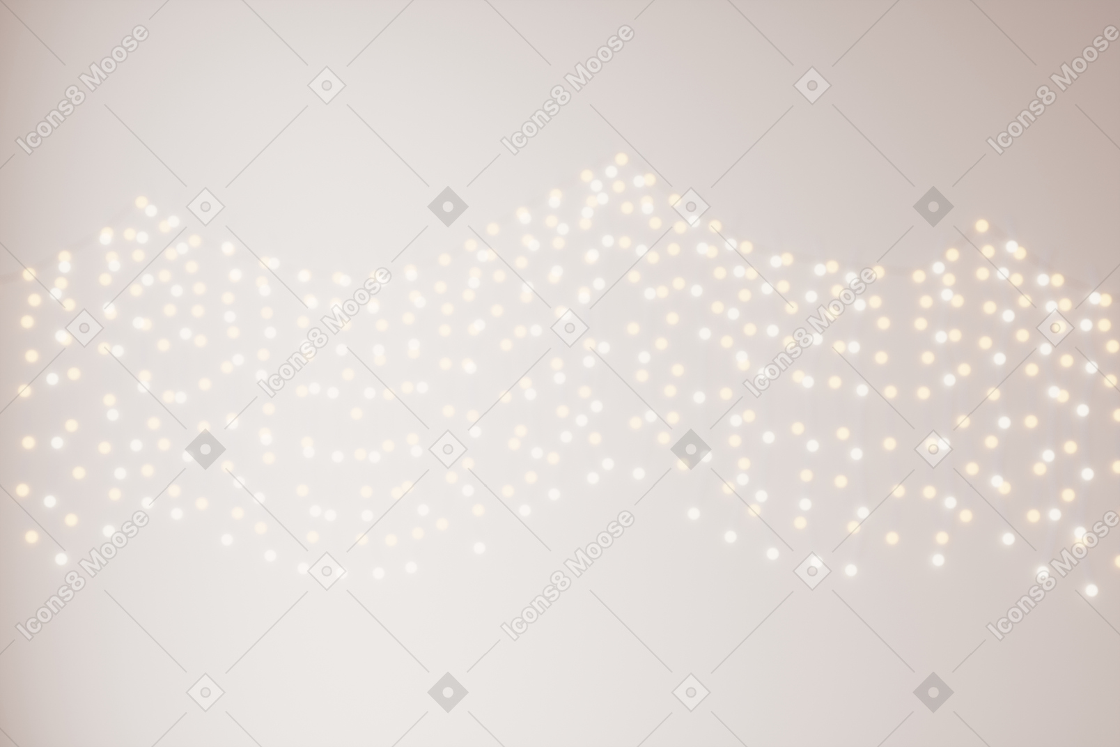 Luces de hadas borrosas en una pared blanca
