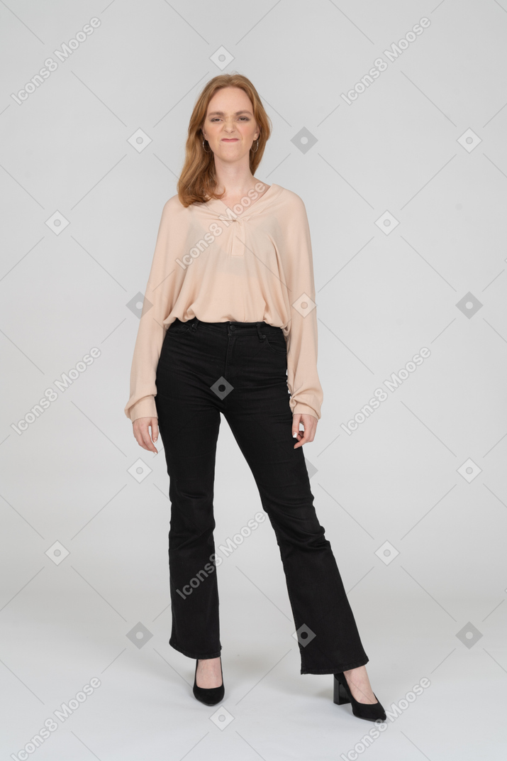 Woman in beautiful blouse standing